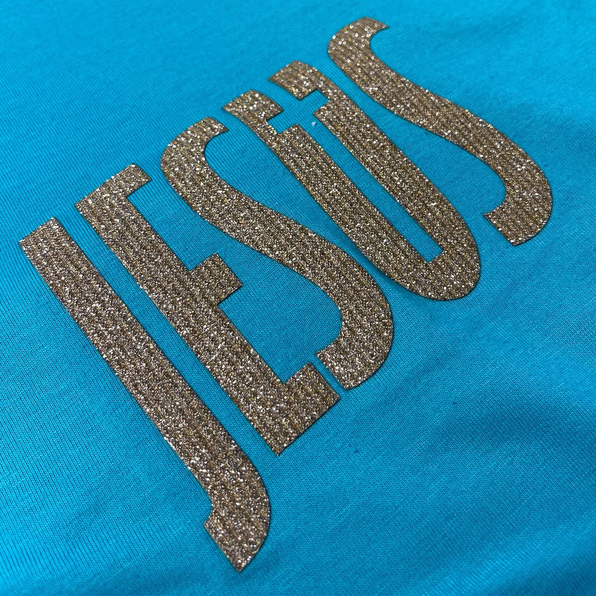 Camiseta Feminina Turquesa Jesus Cruz Glitter