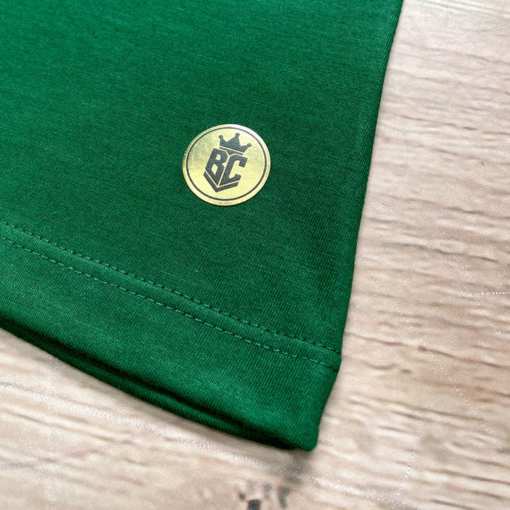 Camiseta Feminina Verde Jesus Nasceu Dourado