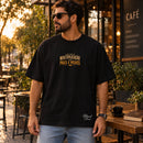 Camiseta Oversized Preta O Milagre da Multiplicação dos Pães e Peixes — Ambientada 01