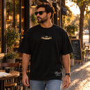 Camiseta Oversized Preta O Milagre da cura do cego — Ambientada 01