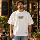 Camiseta Oversized Off White Levanta-te e Anda — Ambientada 01